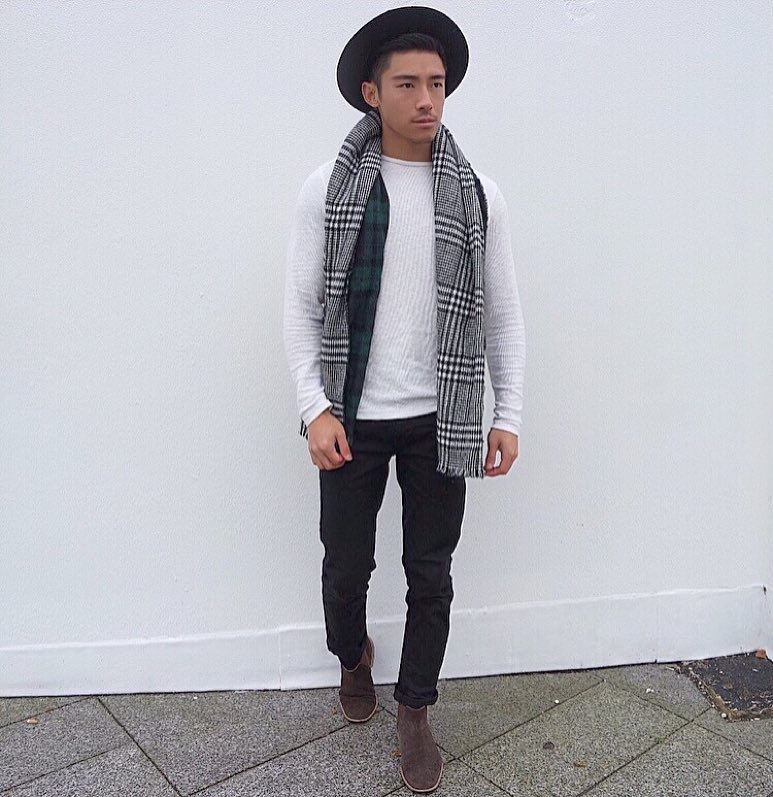 Fedora hat, sweater, scarf, dark trouser, and Chelsea boots