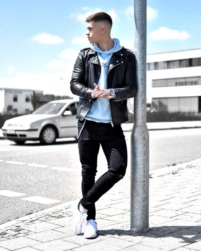 Black leather jacket, hoodie sweatshirt, dark jeans and white sneaker