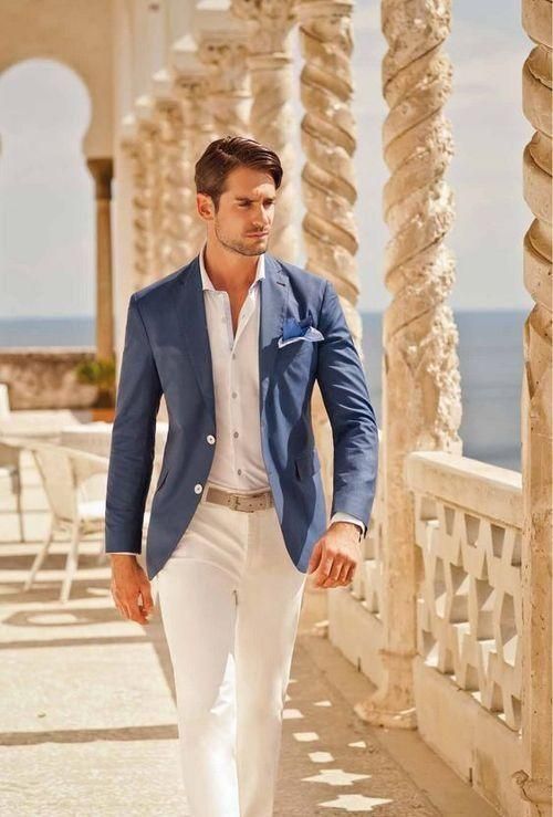 Blue blazer, white shirt, white trousers, belt