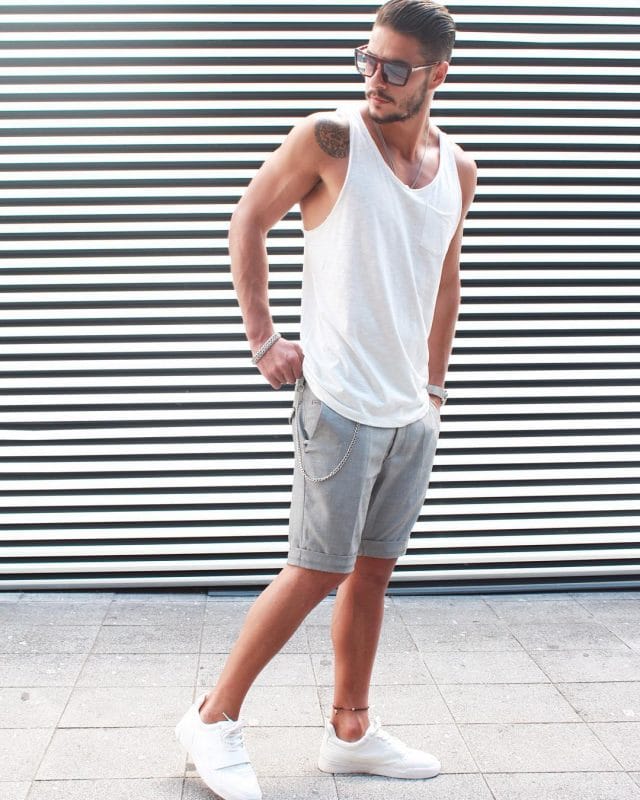 White singlet, short pants, sunglasses and white sneaker