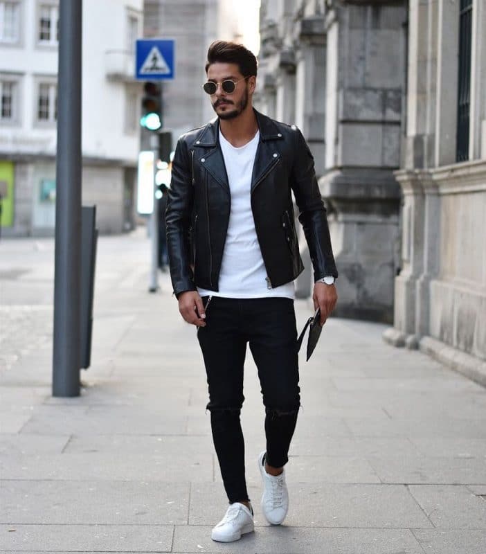 Black leather biker jacket, white tee shirt, black jeans, sneaker and sunglasses