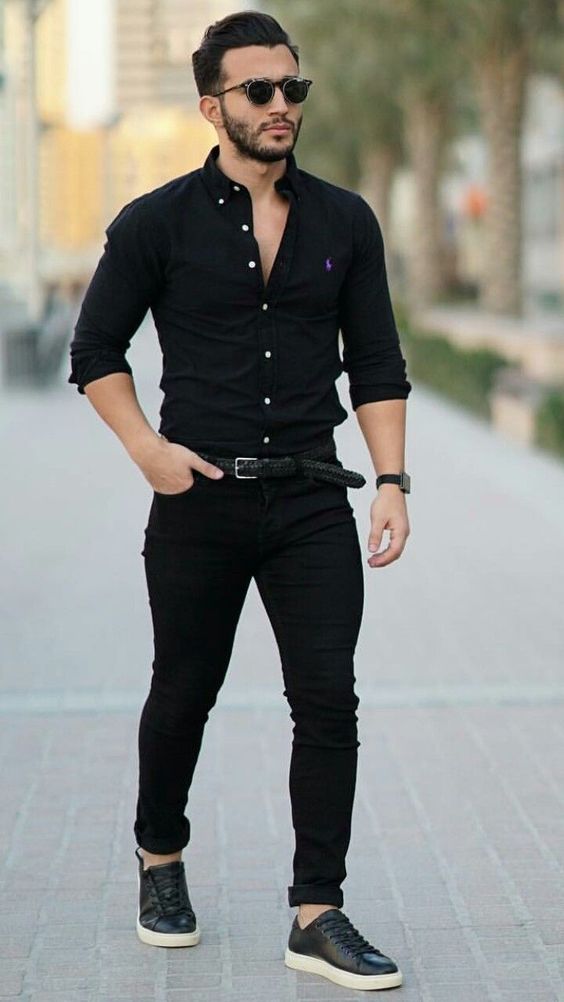 Black shirt, black jeans, sneaker