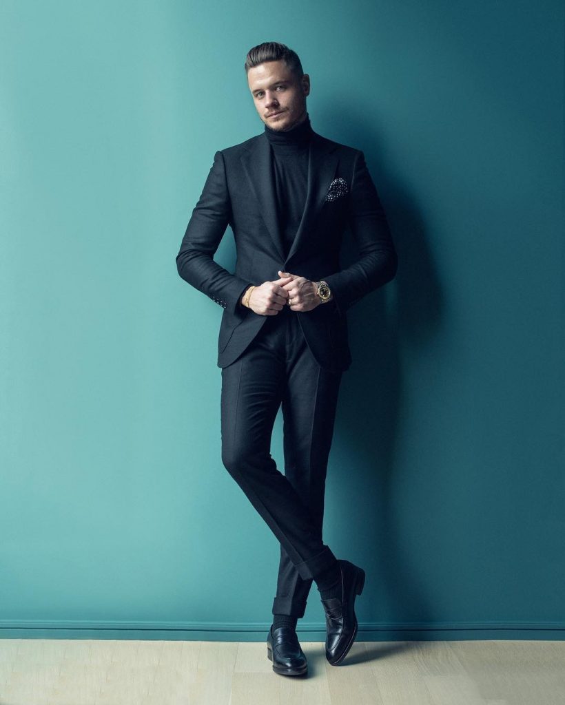 Black sweater, suit, leather shoes