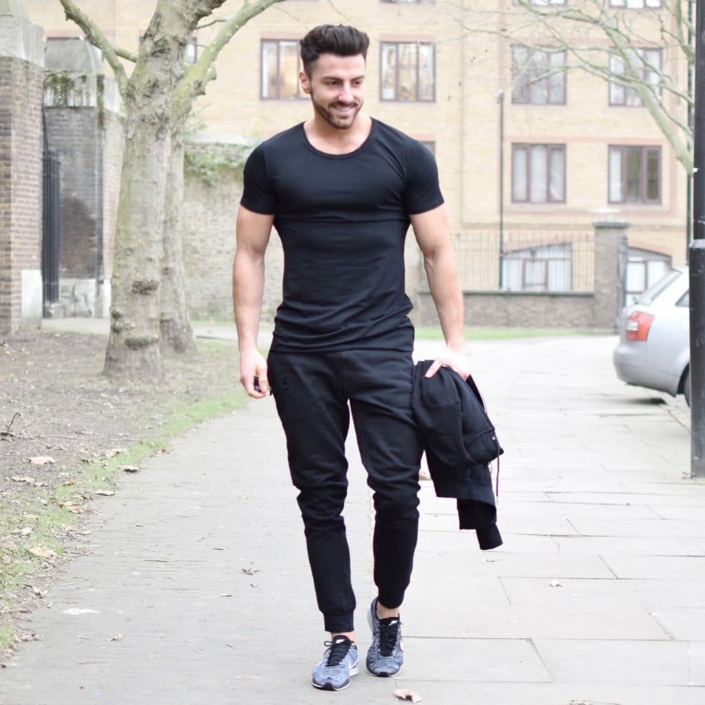 Black tee, sport pants, training shoes