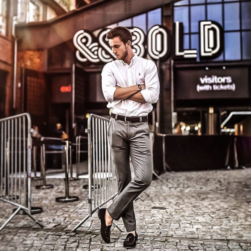 White shirt, leather belt, dress pants, loafers.