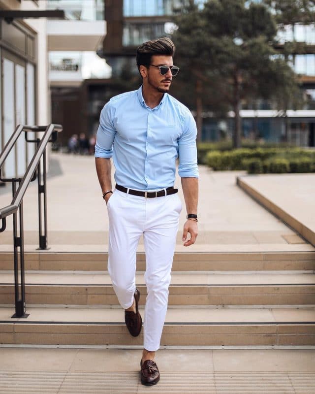 Light blue shirt, belt, white dress pants, and loafers