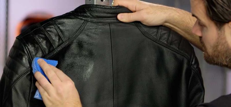 Wash leather jacket with damp cloth