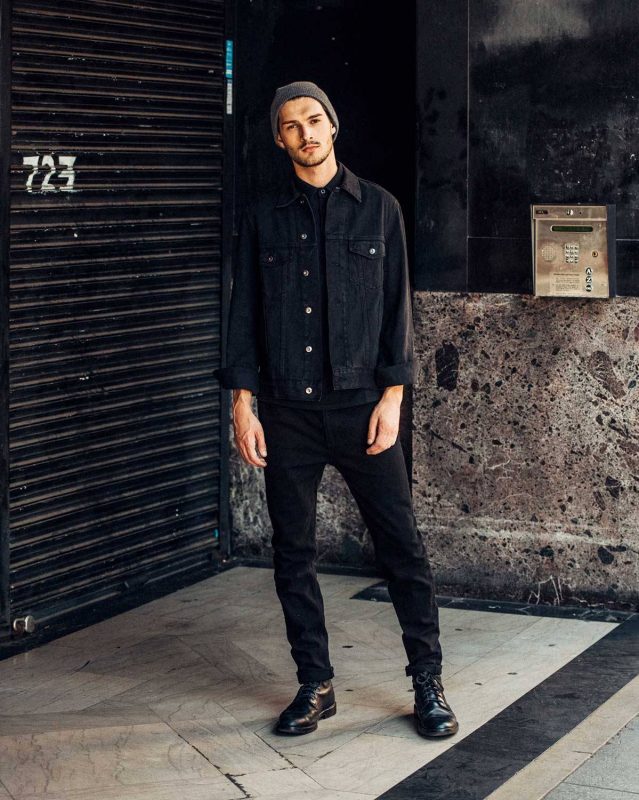 Black denim jacket, black tee, black jeans