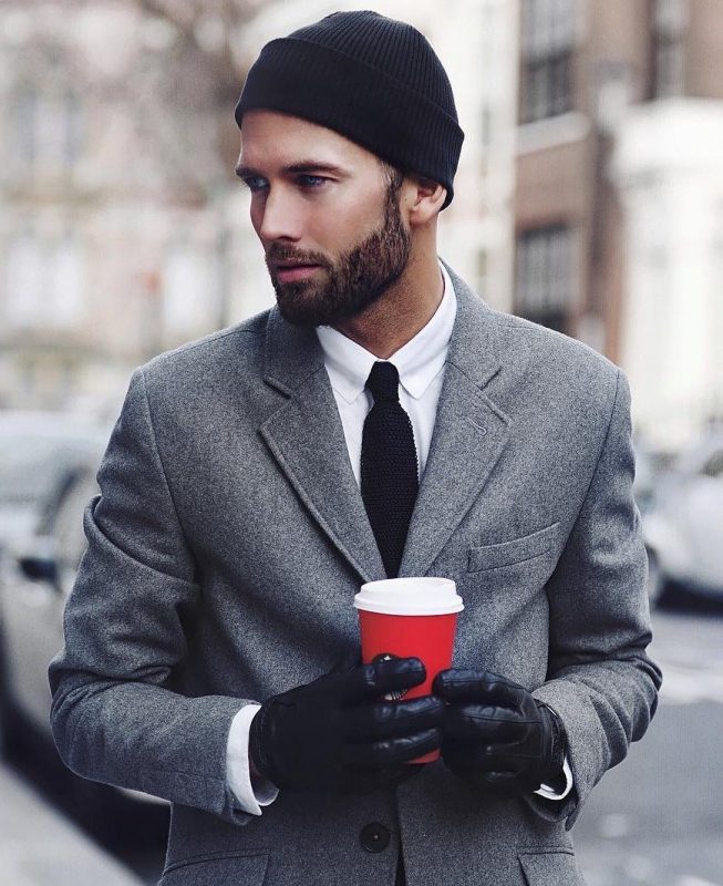 Black cuffed beanie hat, white shirt, black tie, gray wool suit, black leather gloves 1