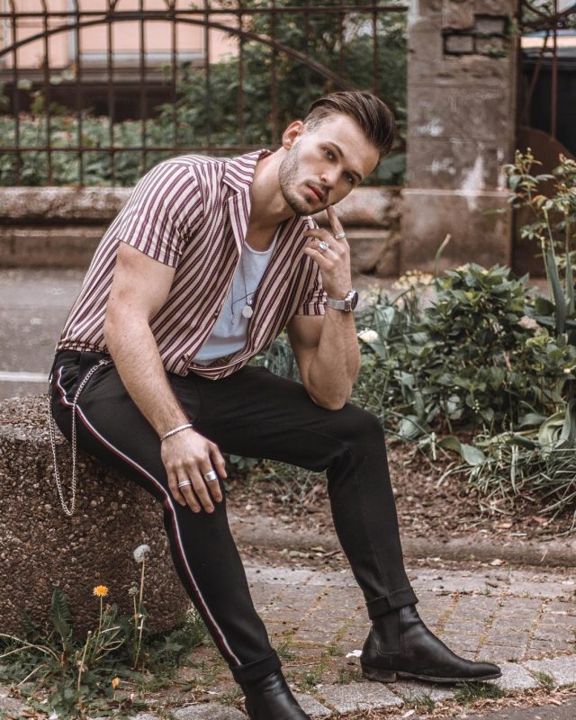 White singlet, print shirt, black trousers, Chelsea boots 1