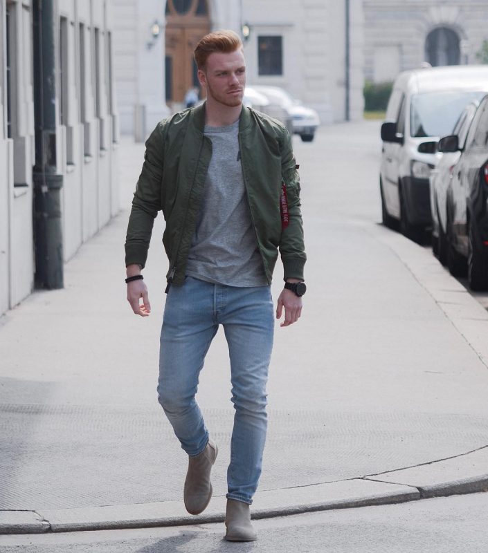 Gray tee, green bomber jacket, blue jeans, Chelsea boots 1