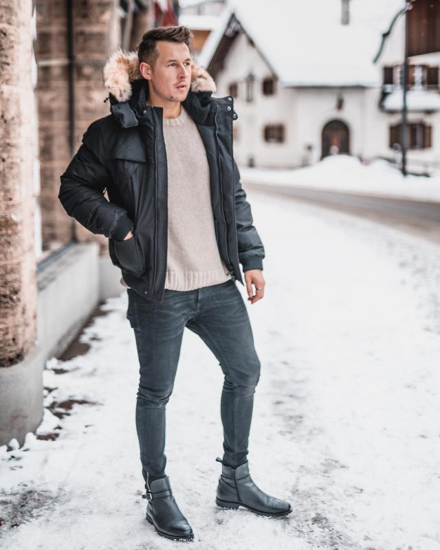 Parka jacket, brown sweater, blue jeans, black leather boots 1