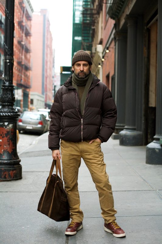 Brown down jacket, khaki pants, sweater, scarf, beanie hat 1