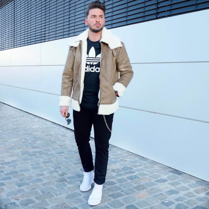 Tan shearling leather jacket, black t-shirt, black jeans, white sneaker 1