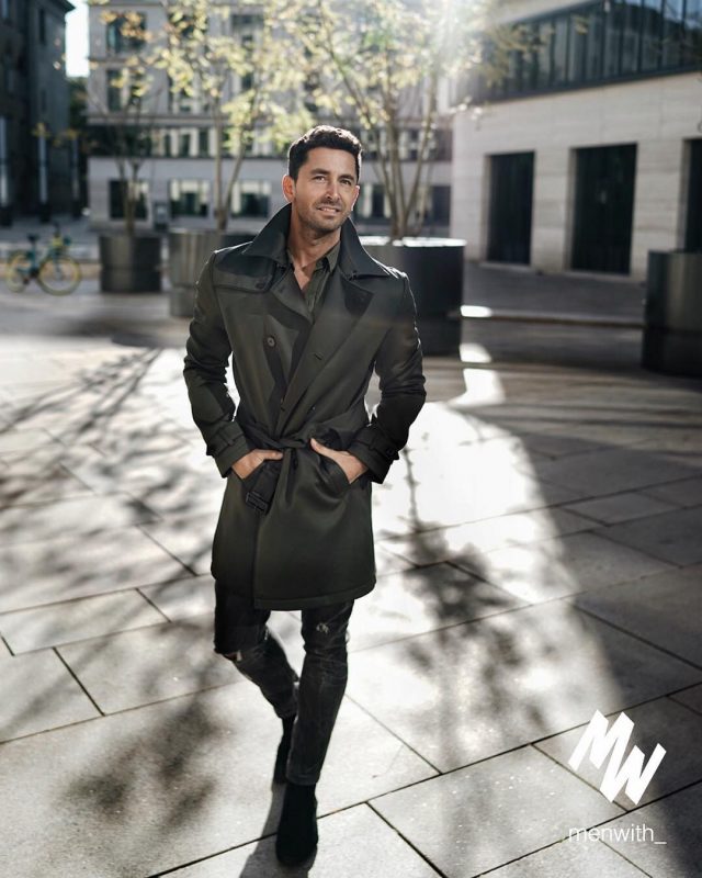 Black trench coat, olive green shirt, black jeans, suede boots 1