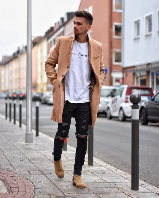 40 mens winter work outfit styles with winter boots. Tan suede Chelsea boots, tan overcoat, white print t-shirt 1