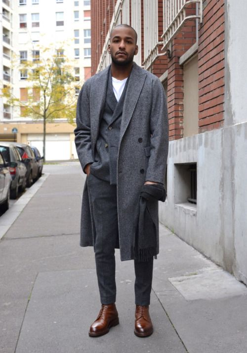 40 mens winter work outfit styles with winter boots. Brown plain toe leather boots, grey overcoat, suit pants 1