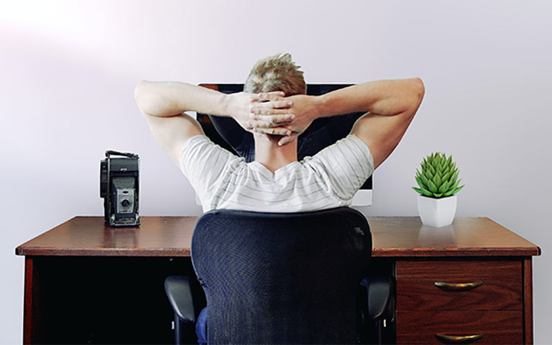 man sitting at desk